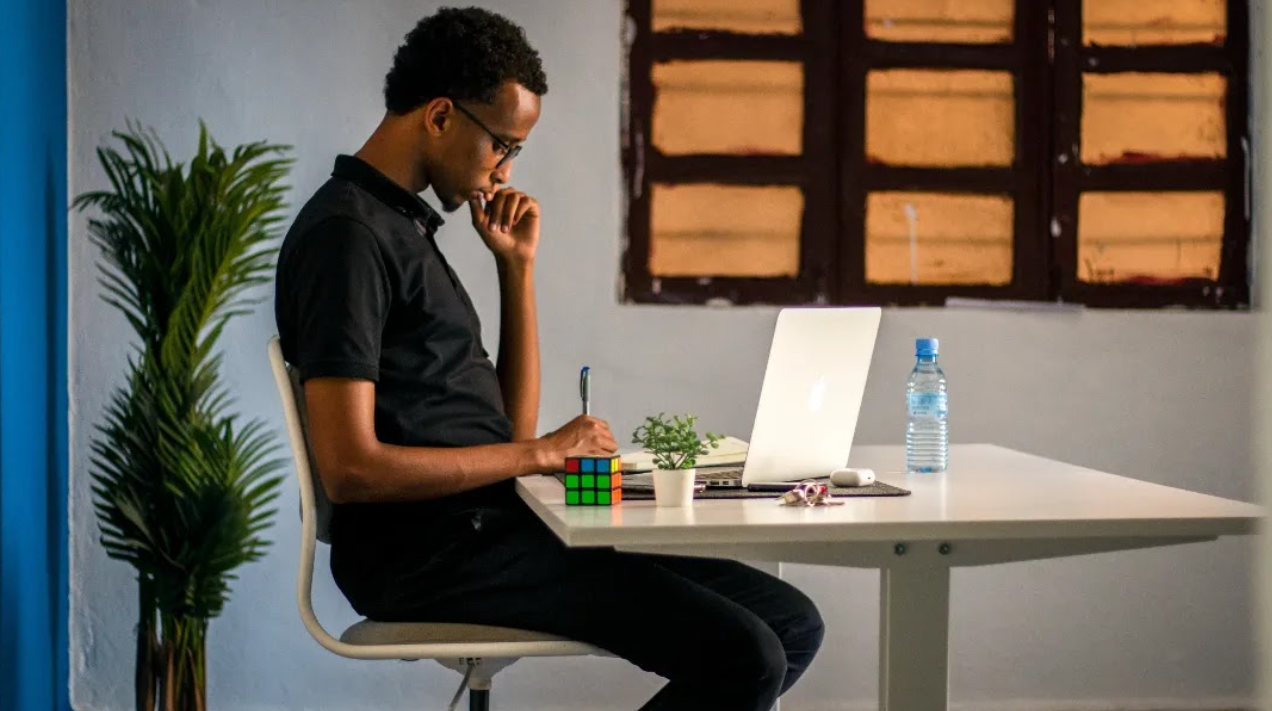 A young male student at Fikrcamp, a boot camp that teaches young people to code in Somali