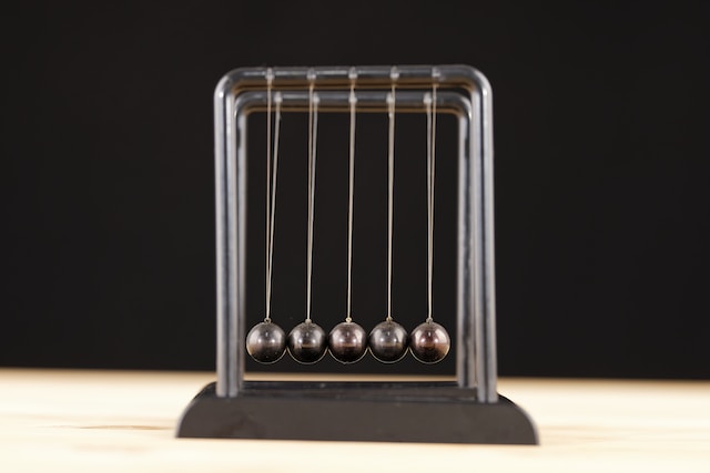 An arrangement of metal pendulums called Metal Newton's cradle Courtesy: Unsplash